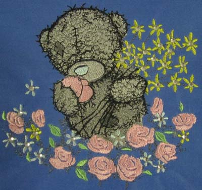 Tatty teddy with sea of flowers machine embroidery collection